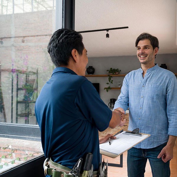 Technician Shaking Hands with Homeowner in Pennsylvania
