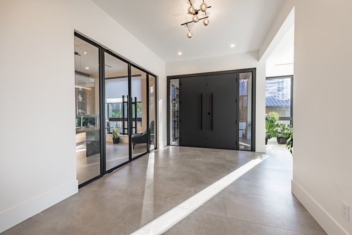 Modern home in Pennsylvania with a large glass door and stylish light fixture